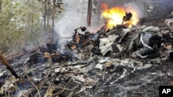 This photo released by Costa Rica's Civil Aviation press office shows the site of a plane crash in Punta Islita, Guanacaste, Costa Rica, Sunday, Dec. 31, 2017. 