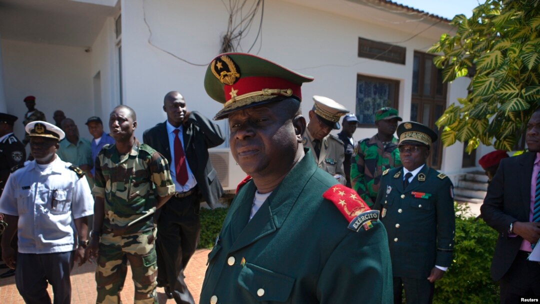 Guinea-Bissau armed forces chief-of-staff General Antonio Indjai (C) leaves a meeting with the president and the regional body of the Economic Community of West African States (ECOWAS) in the capital Bissau, Nov. 7, 2012. 