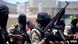 File - Masked Islamic Jihad members.