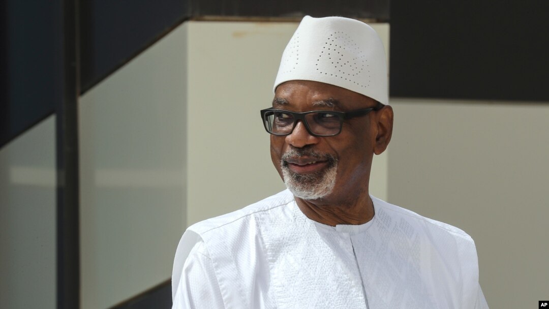 FILE - Mali President Ibrahim Boubacar Keita poses for a group picture during the G5 Sahel summit in Nouakchott, June 30, 2020.