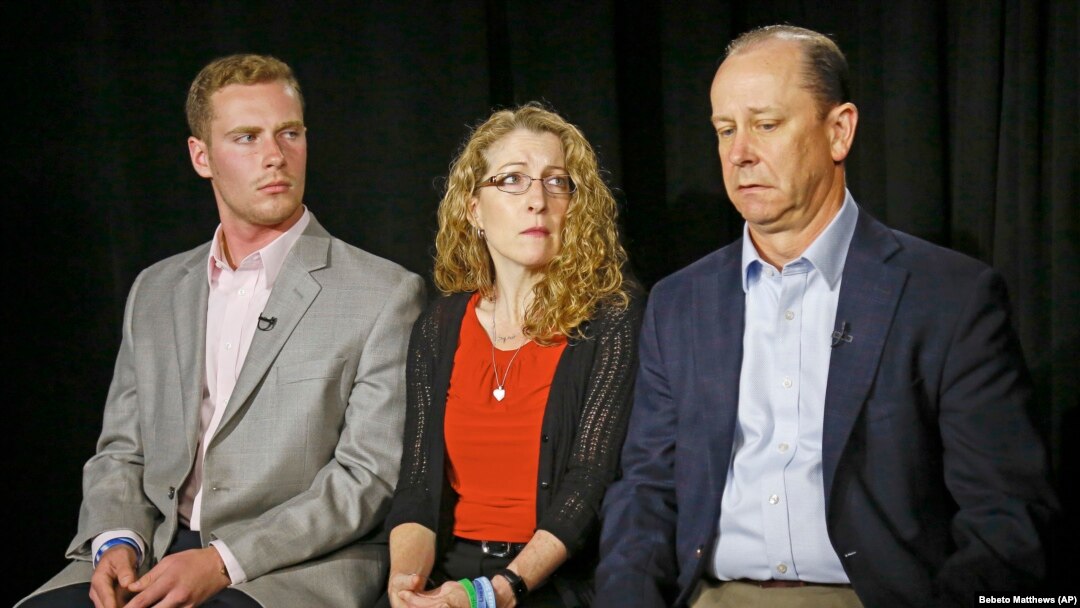 FILE - Jim Piazza, right, seated with his wife Evelyn, center, and son Michael, left, holds back emotions while discussing the death of his son, Penn State University fraternity pledge Tim Piazza, during a 2017 interview in New York. 