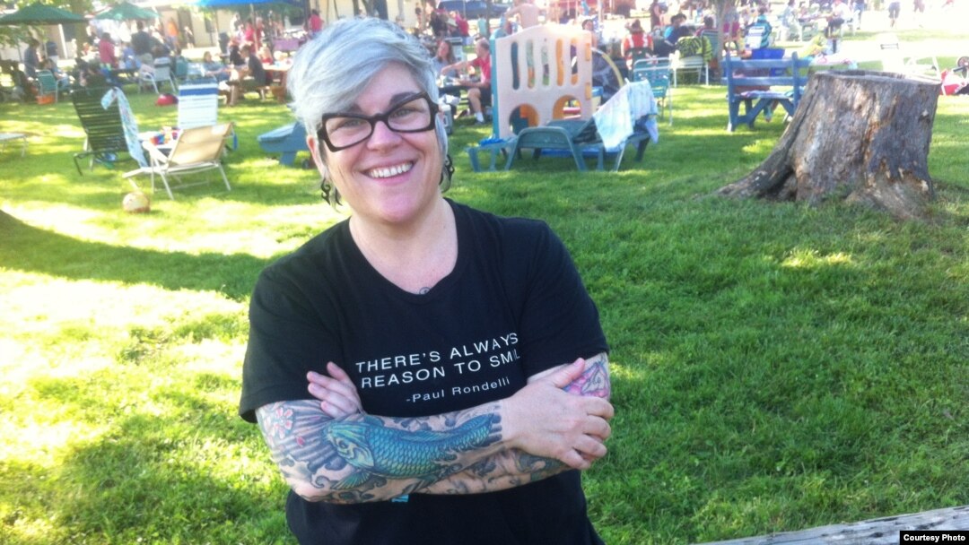 Melissa Thomas, a 47-year-old technology specialist in Washington, D.C., got her tattoos at age 40. (Anna Matteo/VOA)