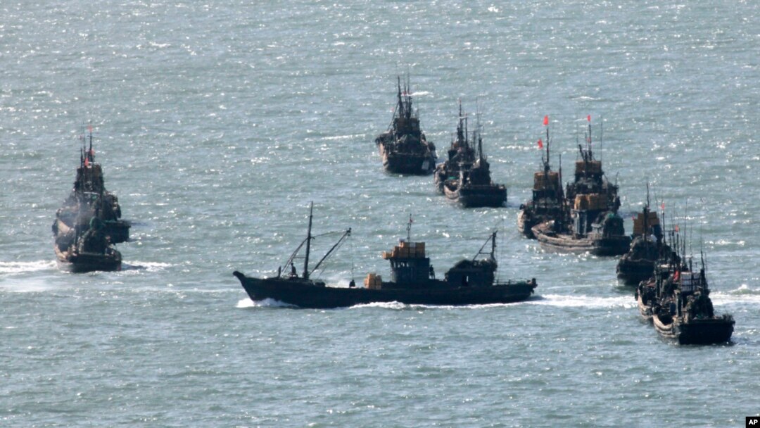 FILE - Chinese fishing boats gather near the South Korea's western Yeonpyong Island, near the disputed sea border with communist North Korea.