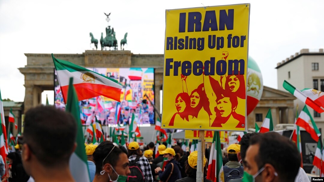Supporters of the National Council of Resistance of Iran (NCRI) gather to protest against the death penalty in Iran, amid the spread of the coronavirus disease (COVID-19), in front of the Brandenburg Gate in Berlin, Germany, July 17, 2020. REUTERS…