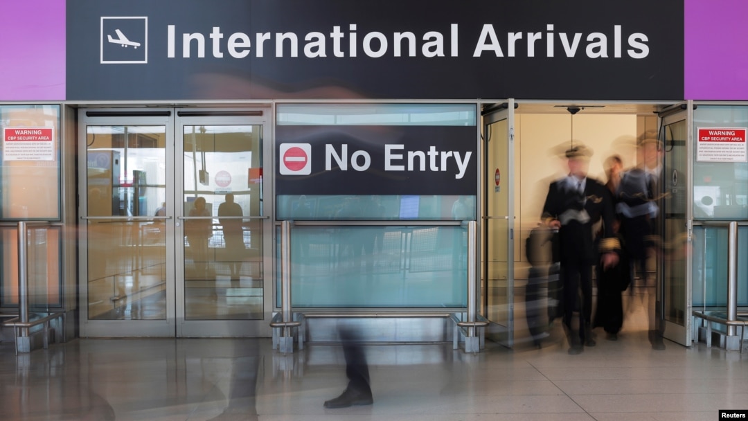 FILE - An Iceland Air flight crew arrives on the day that U.S. President Donald Trump's limited travel ban, approved by the U.S. Supreme Court, goes into effect, at Logan Airport in Boston, Massachusetts, June 29, 2017. 