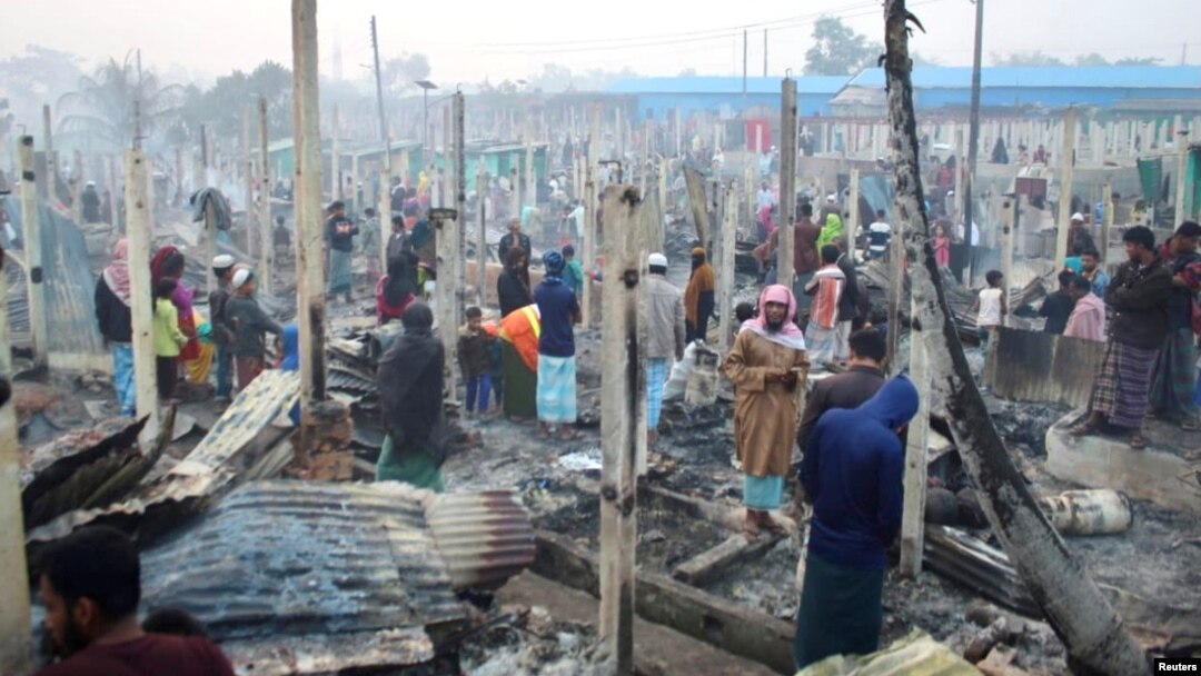 A view of burned houses after a fire broke out at the Nayapara refugee camp in Cox's Bazar, Bangladesh, January 14, 2021. (REUTERS/Mohammed Arakani)