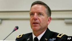 FILE - Maj. Gen. Andrew Rohling, commander of the U.S. Army Southern European Task Force in Africa, is pictured at a press conference in Berlin, Jan. 14, 2020.