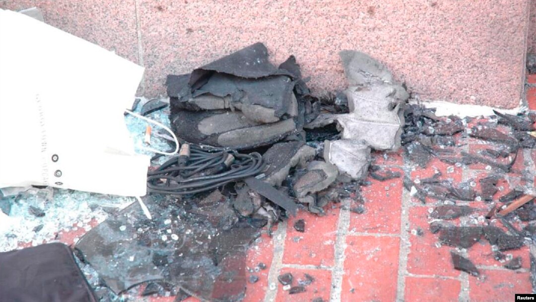 Boston Marathon bomb scene pictures taken by investigators show the remains of an explosive device, April 16, 2013. 