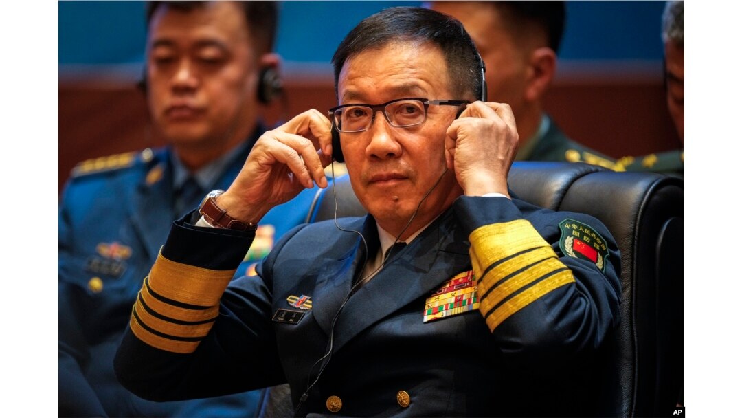 FILE - Chinese Defense Minister Dong Jun listens during the ASEAN-China defense ministers' meeting in Vientiane, Laos, on Nov. 20, 2024.