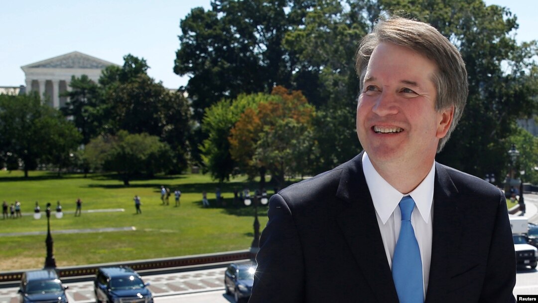FILE - With the U.S. Supreme Court building in the background, Supreme Court nominee judge Brett Kavanaugh arrives for meetings with lawmakers on Capitol Hill in Washington, July 10, 2018. 