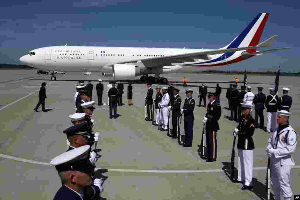 An American Honor Guard greets the French Delegation as their plane arrives at Dulles International Airport.